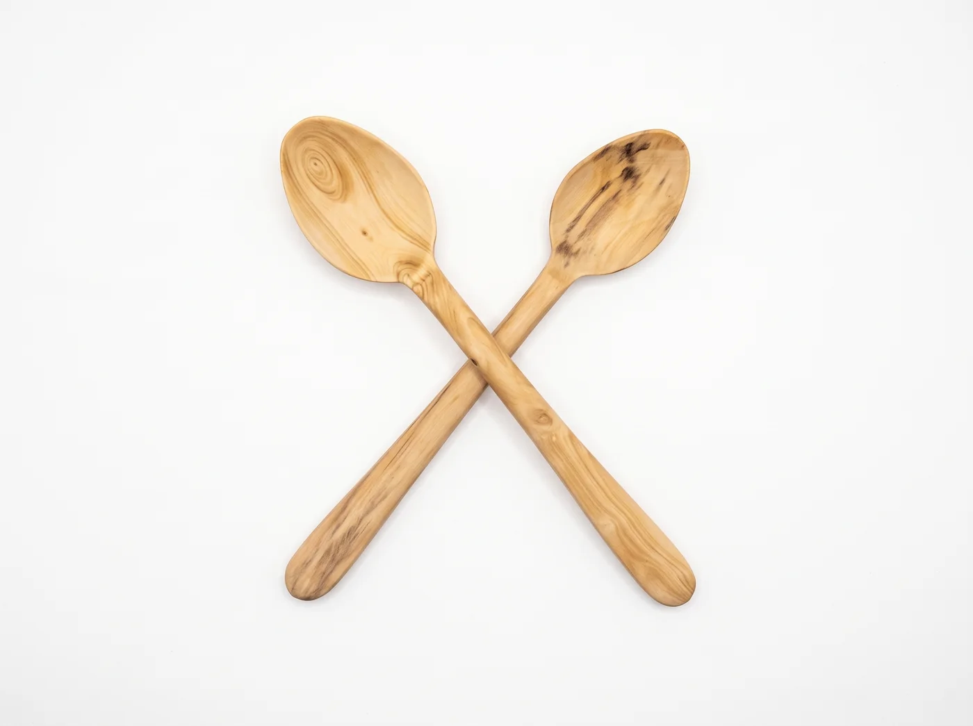 Two boxwood baby feeding spoons